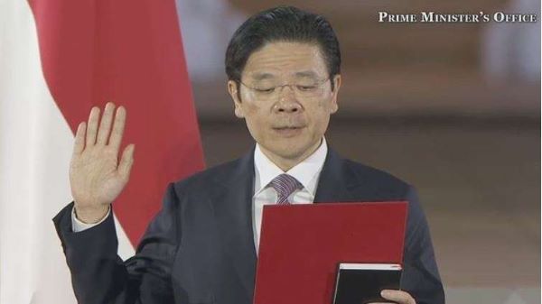M Singapura yang baru, Lawrence Wong saat mengucap sumpah jabatan. (Foto: tangkapan layar Youtube Kantor Perdana Menteri Singapura)