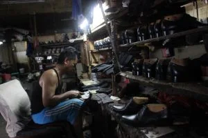 Peran Sistem Komunikasi dalam Meningkatkan Pelayanan Penjual UMKM Bengkel Sepatu