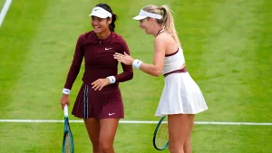 692025-katie-boulter-emma-raducanu-during-match
